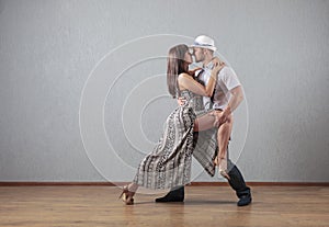 Guy and girl in dance movement .