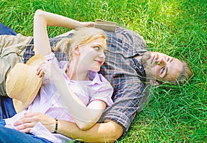 Guy and girl dreamy relaxed enjoy tranquility nature. Couple in love relaxing outdoors. Take minute to relax. Nature