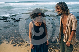 Guy and girl have fun on the beach