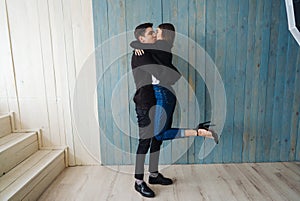 The guy and the girl are hugging