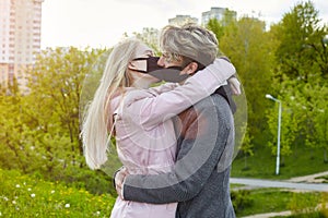 Guy and girl kissing. expressing a desire to remove the mask and be free. the concept of freedom and relationships without