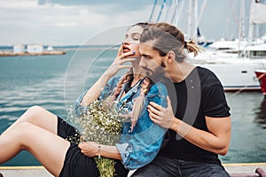 Guy and girl on pier