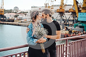 Guy and girl on pier