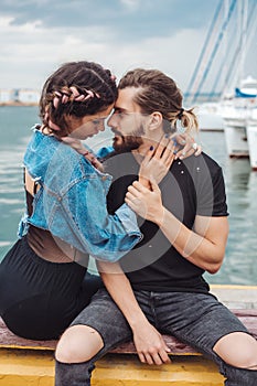 Guy and girl on pier