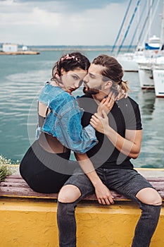 Guy and girl on pier