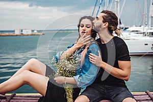 Guy and girl on pier