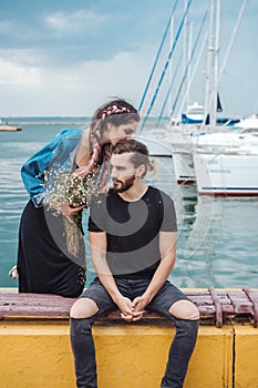 Guy and girl on pier