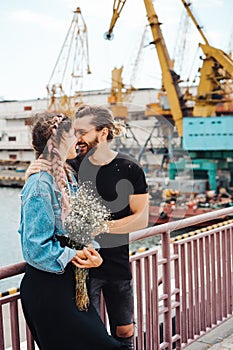 Guy and girl on pier