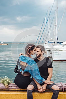 Guy and girl on pier