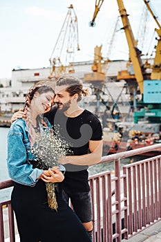 Guy and girl on pier