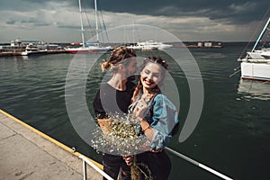 Guy and girl on pier