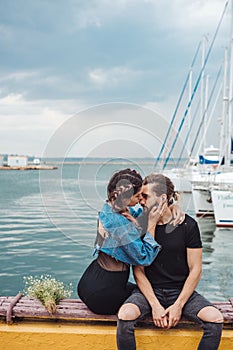 Guy and girl on pier