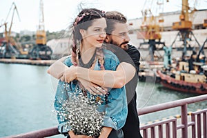 Guy and girl on pier