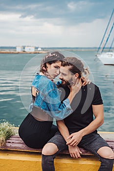 Guy and girl on pier