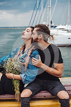 Guy and girl on pier