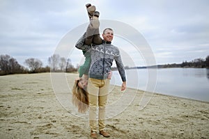 The guy and the girl are on the river bank