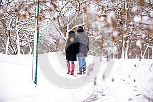 A guy and a girl walking