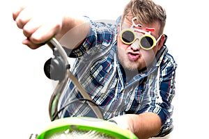 Guy with glasses in a bike