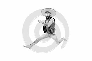 Guy happy cheerful face having fun dancing jumping. Life in motion. Man bearded cheerful guy wear sombrero mexican hat