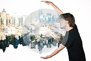 Guy holding abstract city