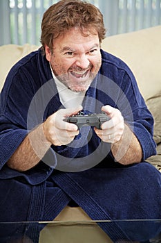 Guy at Home Playing Video Games