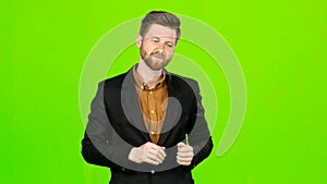 Guy jokes, he is not bored, he is happy and positive. Green screen