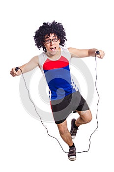 Guy jumps with skipping rope isolated on white