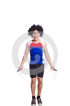 Guy jumps with skipping rope isolated on white