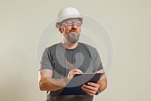 A guy looks through work documents