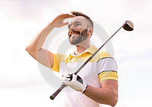 Guy playing golf