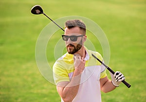 Guy playing golf