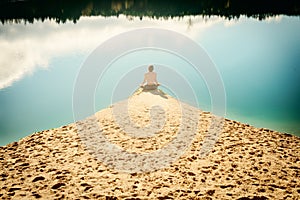 Guy practices asanas on yoga in harmony with nature