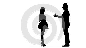Guy proposes to marry the girl she says no. Silhouette. White background