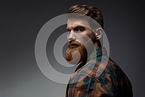 Guy with a red beard in a plaid shirt