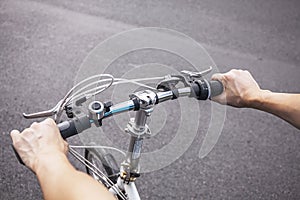 A guy riding and commuting on his bicycle with motion