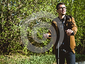 The guy riding on the kickscooter