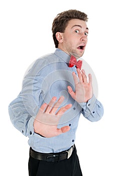 Guy in a shirt and bow tie locked arms experiencing negative emo
