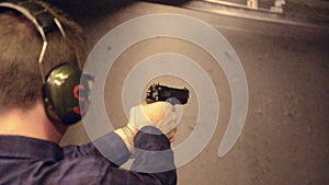 Guy shooting the Beretta-92FS