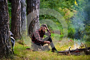 Guy with tired face and lonely at picnic or barbecue.