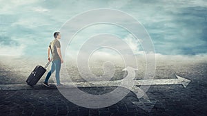 Guy traveler carrying his rolling suitcase, walking on a crossroad line split in three different ways as road arrows