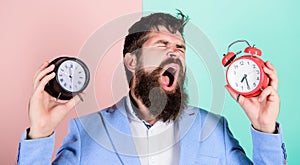 Guy unshaven puzzled face having problems with changing time. Time zone. Changing time zones affect health. Does