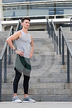 Guy wearing sportswear. Muscular young fitness sports man athlete in compression garment. Staying fit and healthy. ready