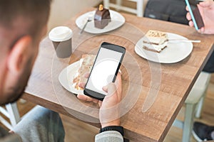 Guy work on modern smart phone with isolated screen for mockup