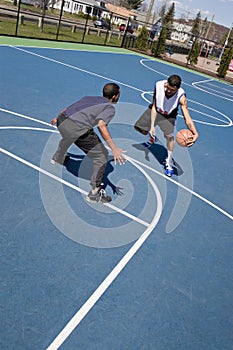 Guys Playing Basketball