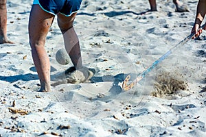 Guys Playing Beach Hokey on Official Competition in Summer on the Sand