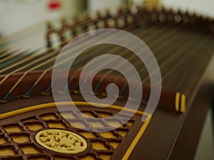 Guzheng with blurred strings musical instrument photo