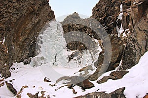 Gveleti waterfall near the Georgian Military Road in winter
