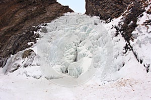 Gveleti waterfall near the Georgian Military Road in winter