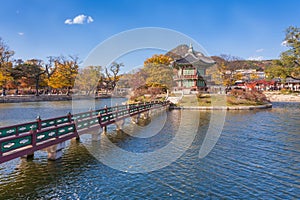 Gyeongbokgung palace in autumn, lake with blue sky, Seoul, South