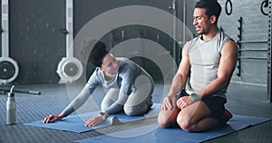 Gym couple high five, laugh workout on floor and fitness exercise for body wellness together. Tired teamwork goal, comic